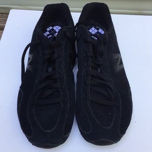 New Balance black sneakers